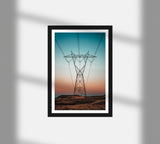 A stunning photographic poster of wires right through the desert a thousands of miles. Bring a touch of sun to your wall. Museum-quality posters made on thick and durable matte paper.